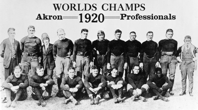 Portrait of the Akron Professionals, the first NFL champions, 1920. The team was led by All-America halfback Fritz Pollard (first row, far right), who in 1921 became the first African-American coach in NFL history. The NFL was formed in 1920 as the American Professional Football League (APFA) and was renamed the National Football League in 1922. (Photo by Bruce Bennett Studios via Getty Images Studios/Getty Images)
